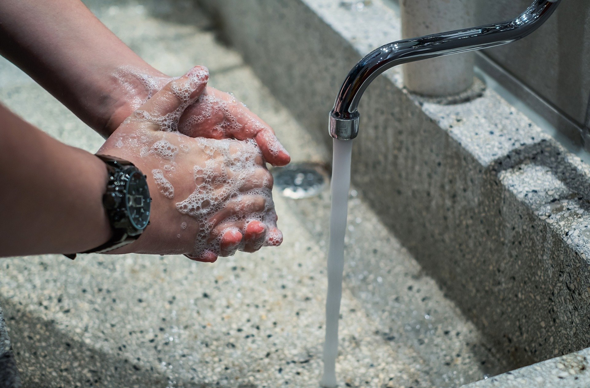 A man washing his hands