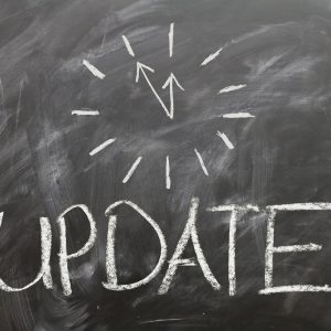 A chalkboard with "update" written on it